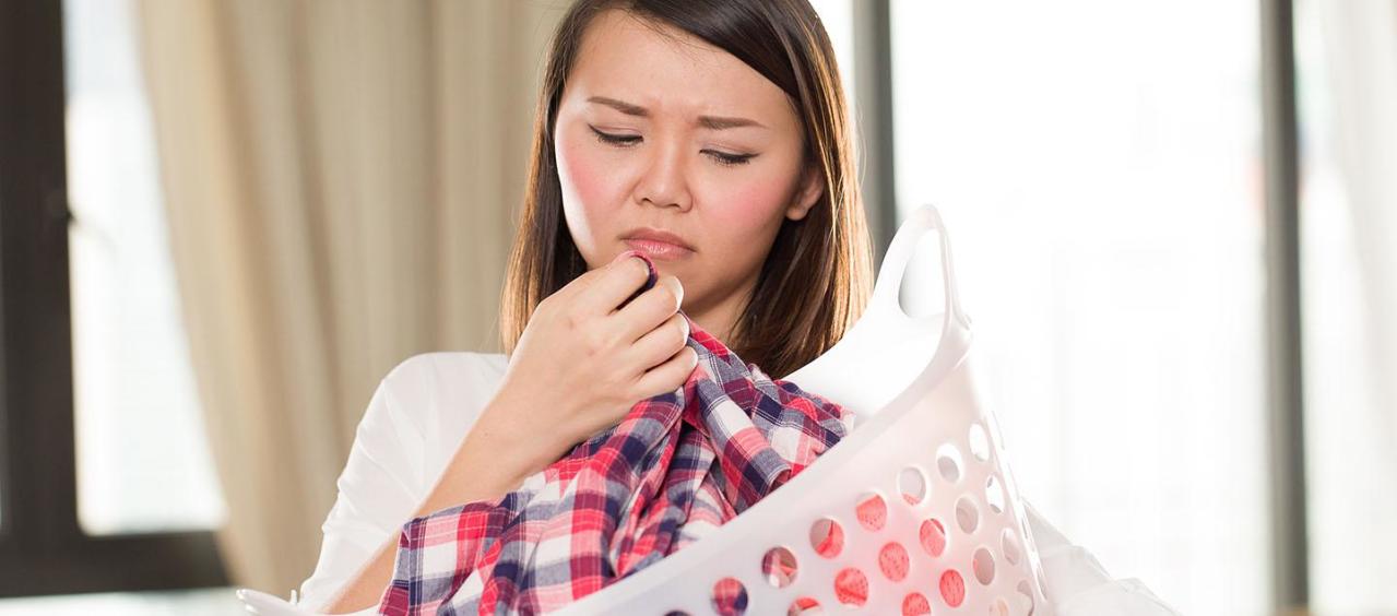 A woman unhappy with the smell of her laundry.