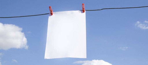 A white napkin on a washing line.