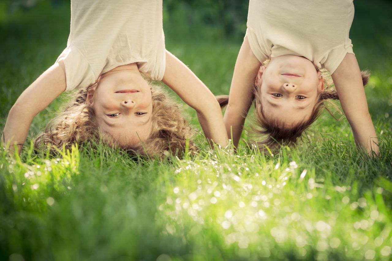 Children doing hand stand