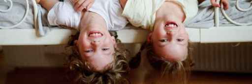 two children upside down