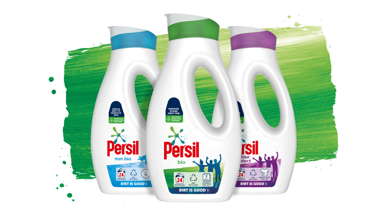 Three Persil liquid bottles against a green paint stroke background