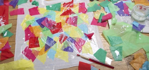 Making stained glass using tissue paper.