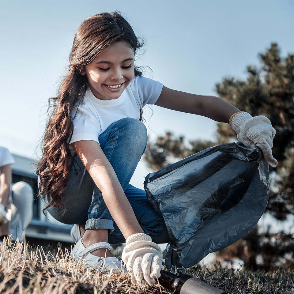 Picture of girl picking up rubbish